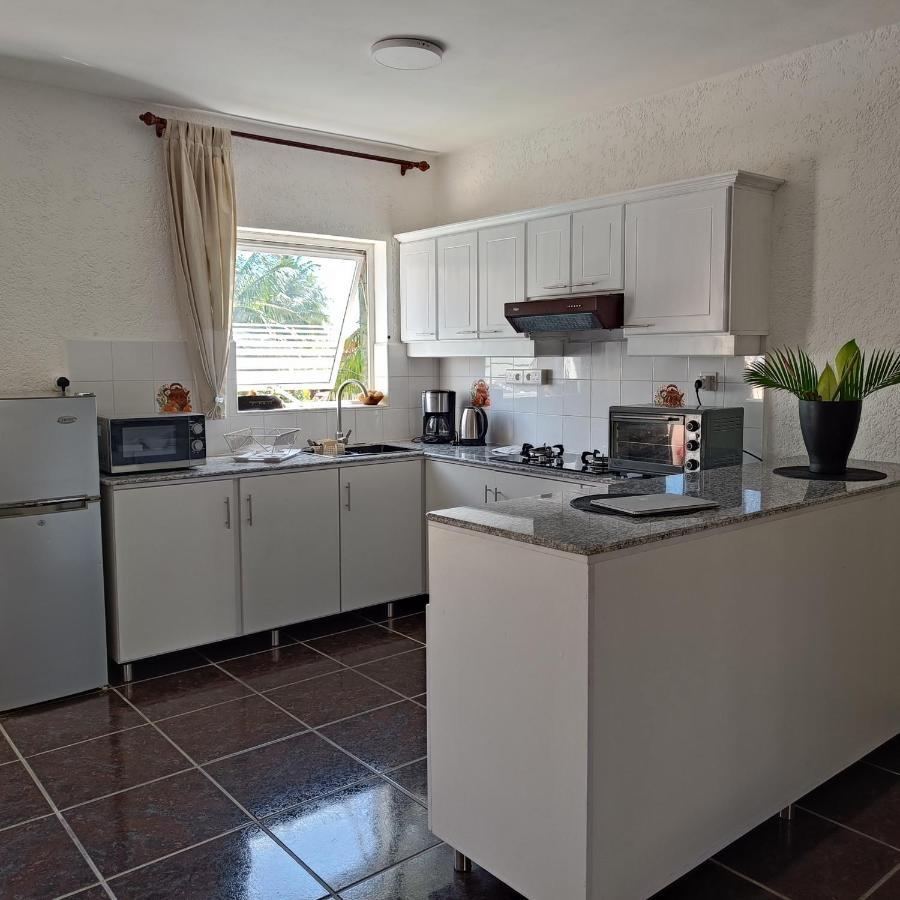 The Coastal Apartment Flic en Flac Luaran gambar